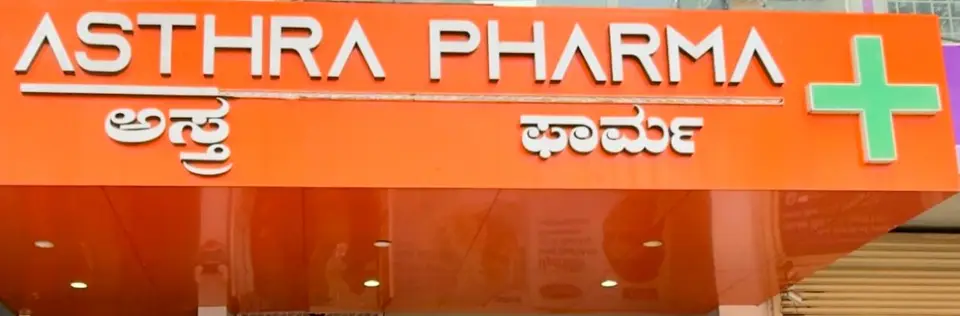 Asthra Pharmacy storefront on BB Road, Devanahalli